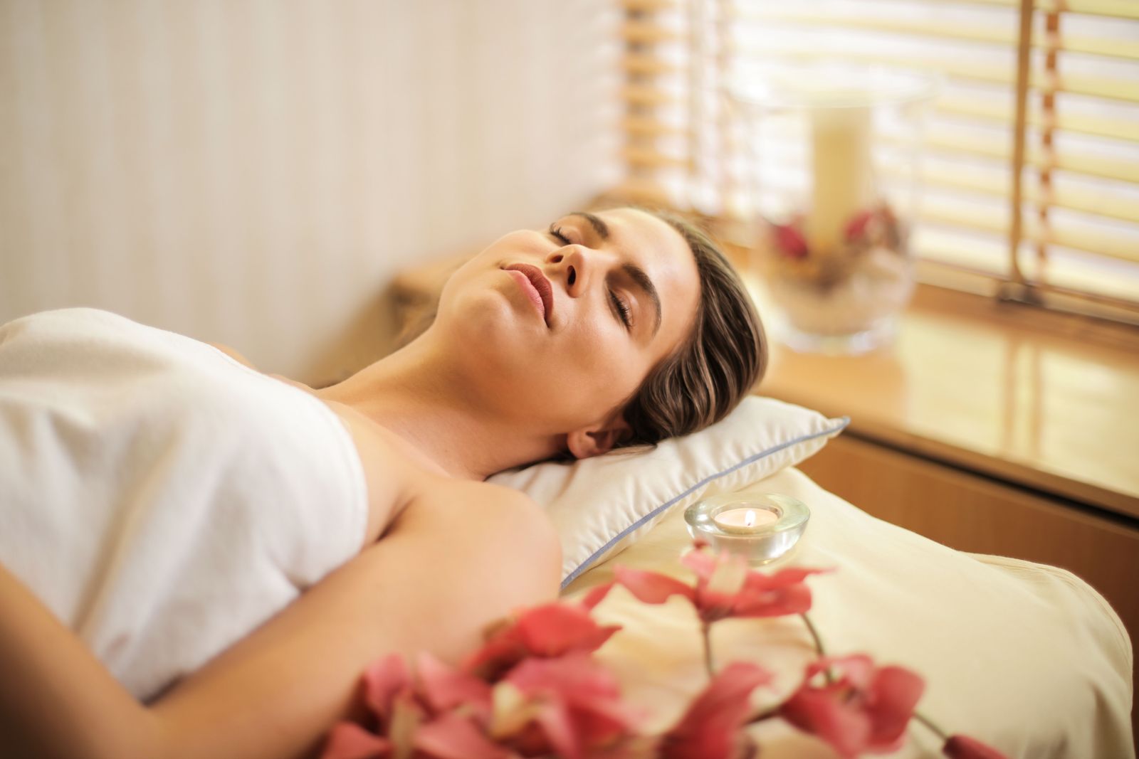 Guest relaxing during a wellness treatment
